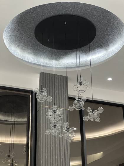 Bubble-glass cascade, stairwell — decorative lighting made by SARA Enterprises, Greater Noida