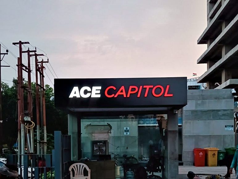 Experience-centre frontage branding — fascia identity and glazed frontage graphics for a project sales gallery.