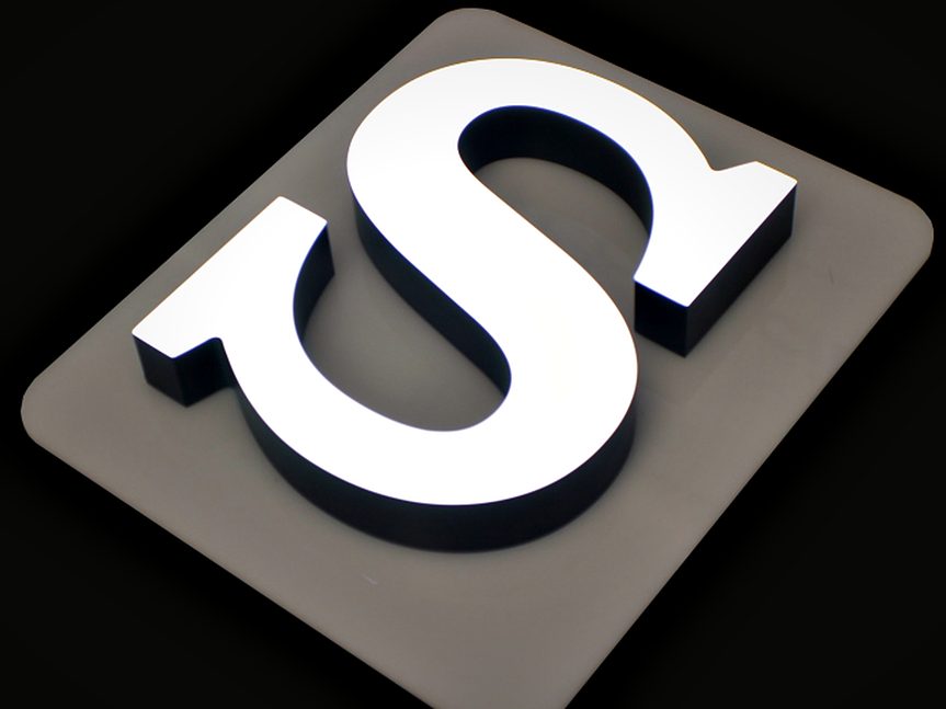 Detail of a fabricated dimensional letter — clean returns, tight radii and an even face, the test of good metal signage.